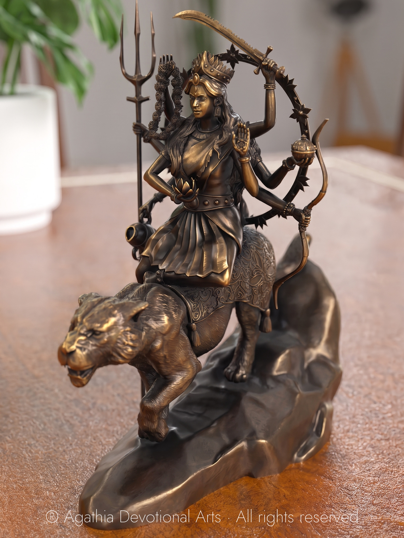 Durga bronze murti, three-quarter view with the tiger