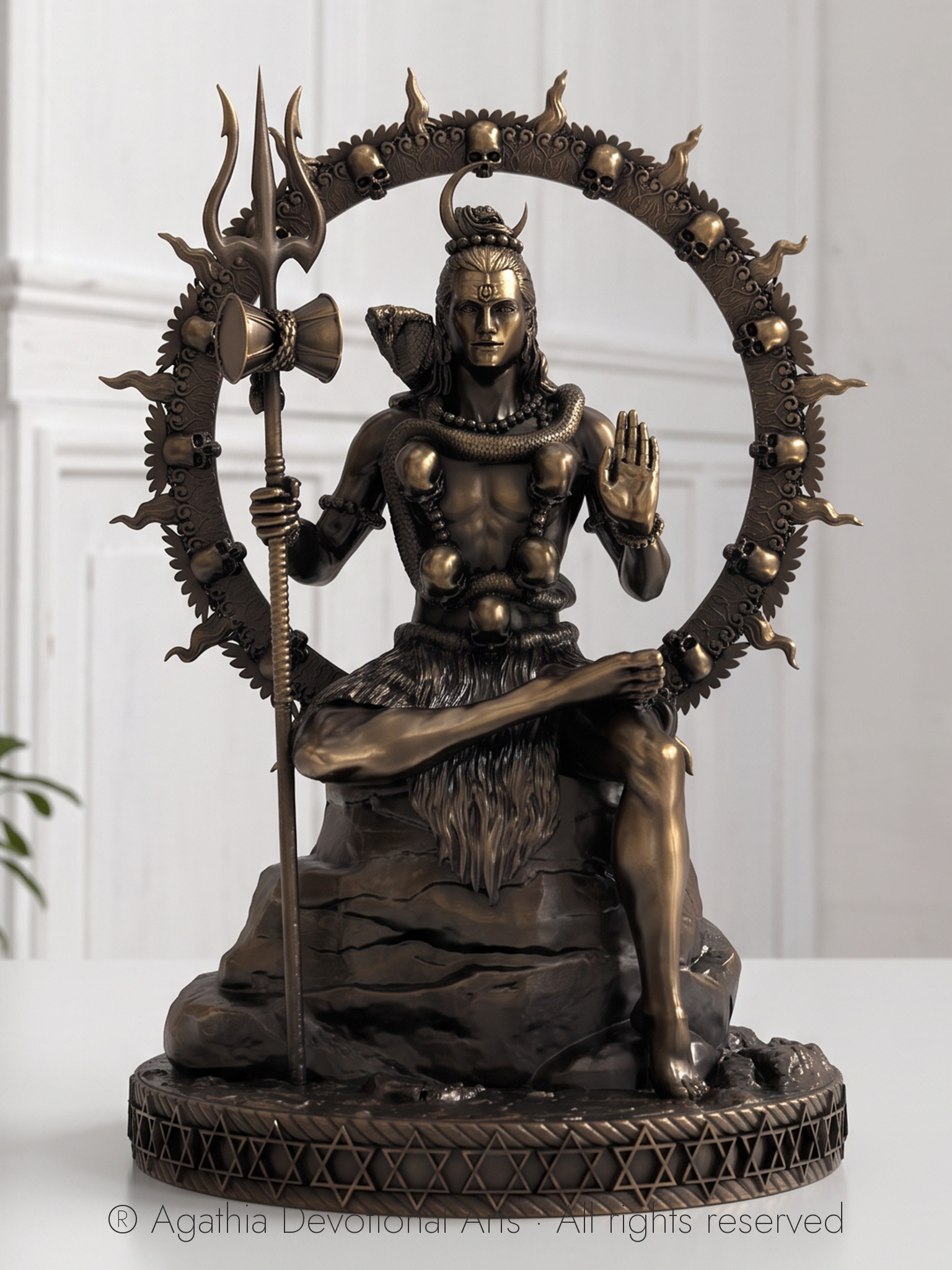 Shiva bronze murti with trident and aureole, front view